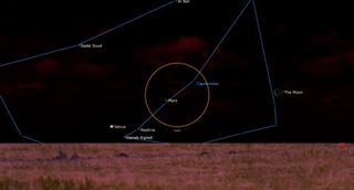 a low, red-hued horizon sits below a dark sky with faint red clouds. an orange outline circles mars and part of the constellation capriocrnus, traced in blue. the crescent moon hangs mid right center.