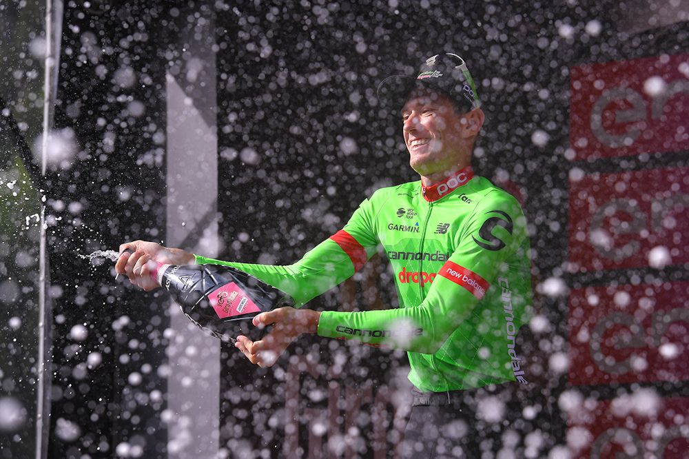 Pierre Rolland celebrates on the Giro d'Italia podium after winning stage 17