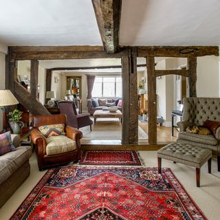 living room with wooden flooring and sofa set