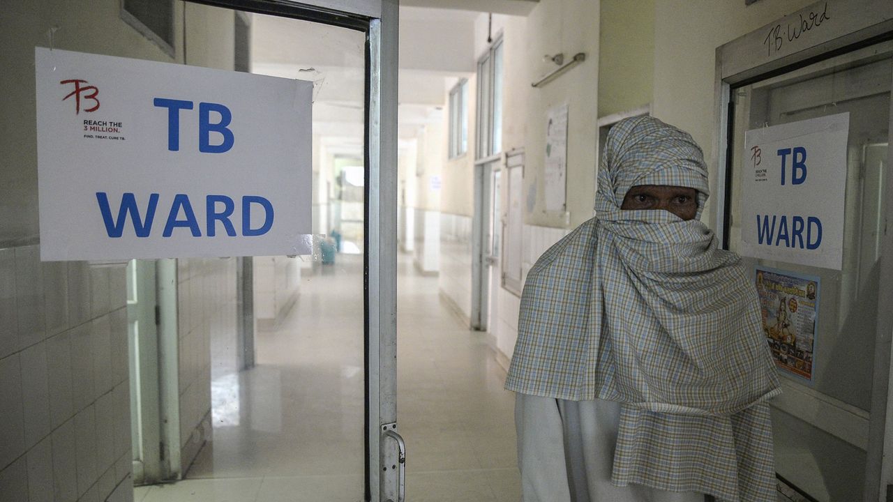 A man looks out from the tuberculosis ward in a hospital in the Indian city of Jalandhar.