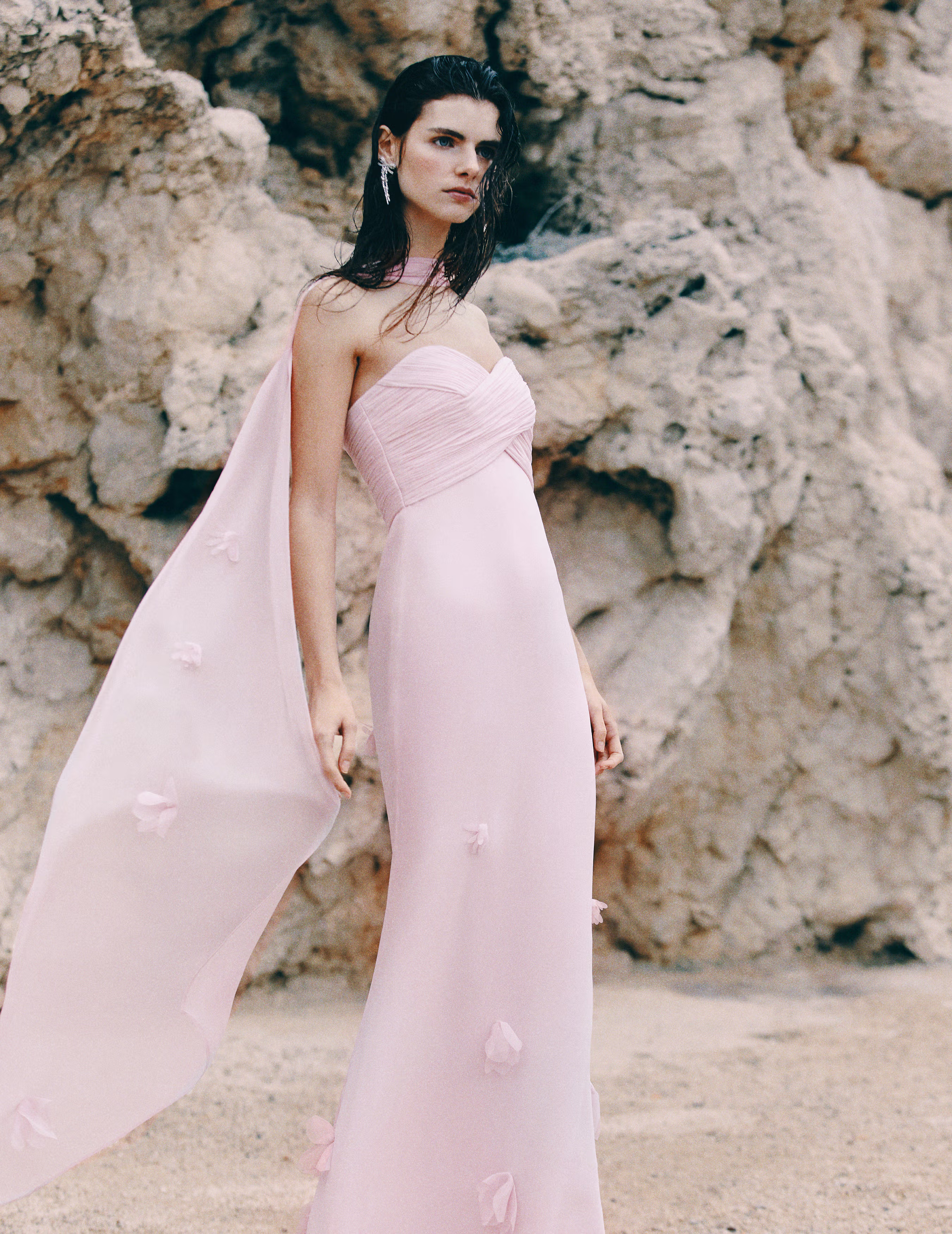 A model wearing a pink Self-Portrait bridesmaid dress.