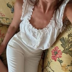 Woman in pretty white milkmaid top