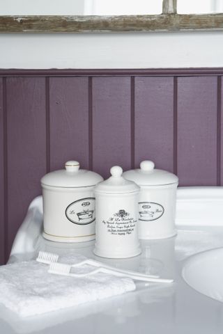ceramic jars on a bathroom vanity