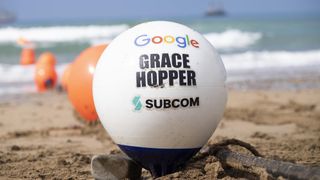 A buoy of the Grace Hopper cable on a Cornwall beach