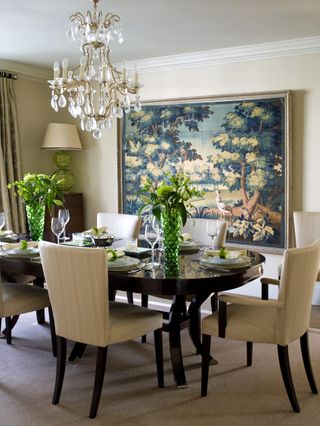 glamorous dining room with chandelier by Sims Hilditch