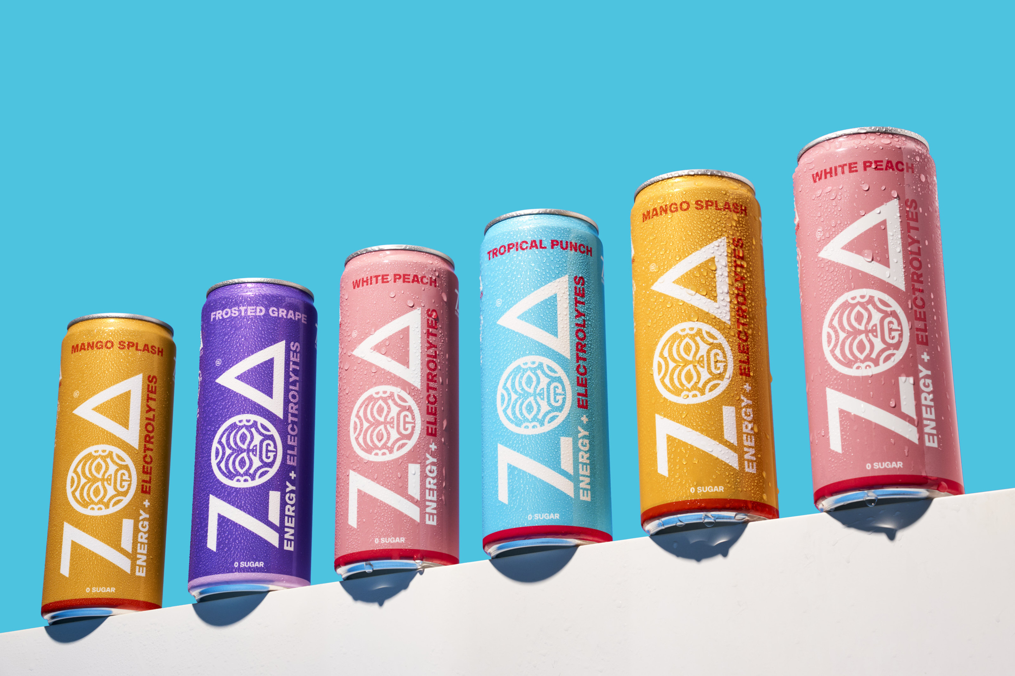 Line of six different-colored cans on a white ledge, the ZOA logo is written on each can 