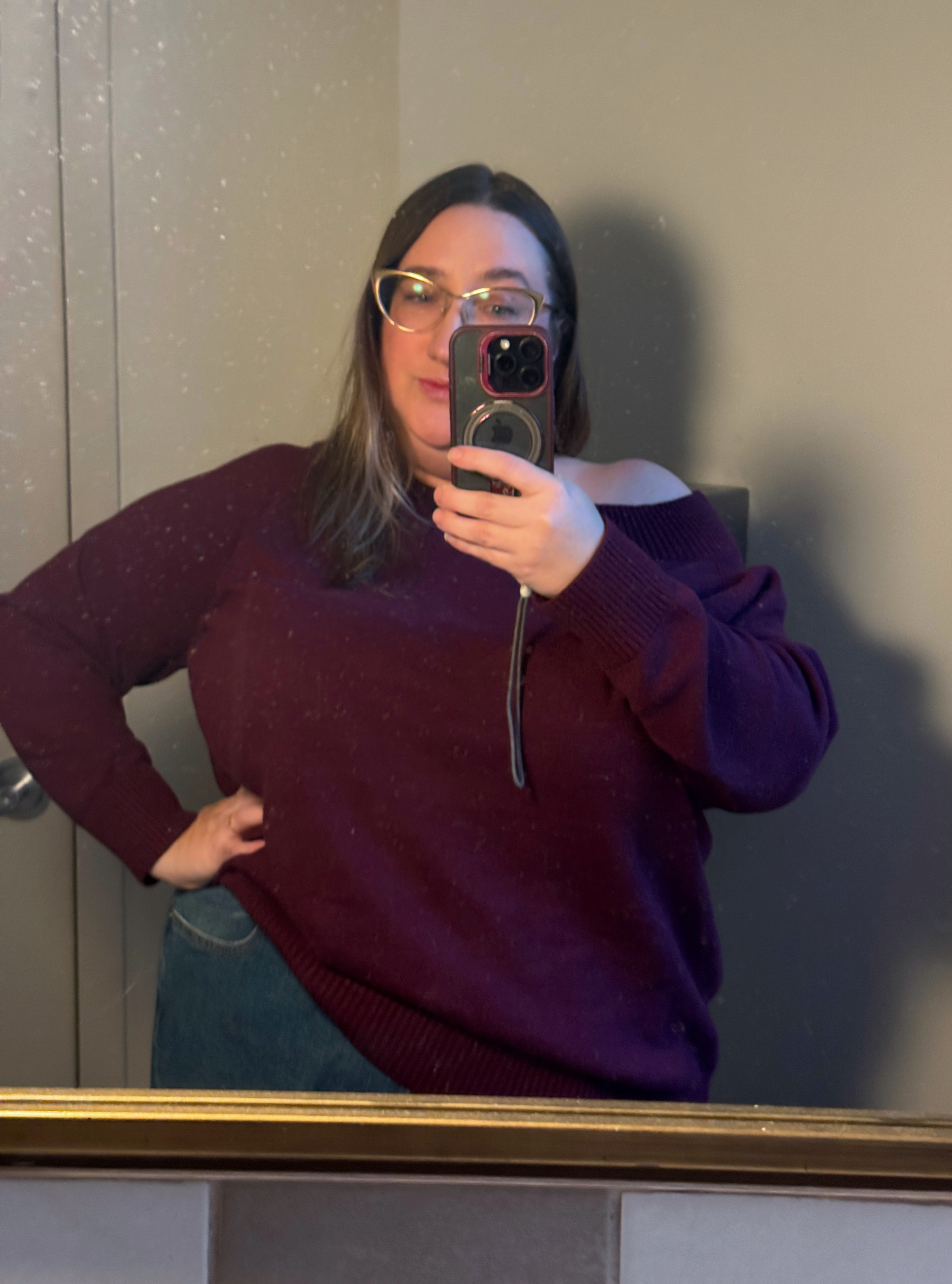 Sarah Chiwaya wearing a sweater from Universal Standard