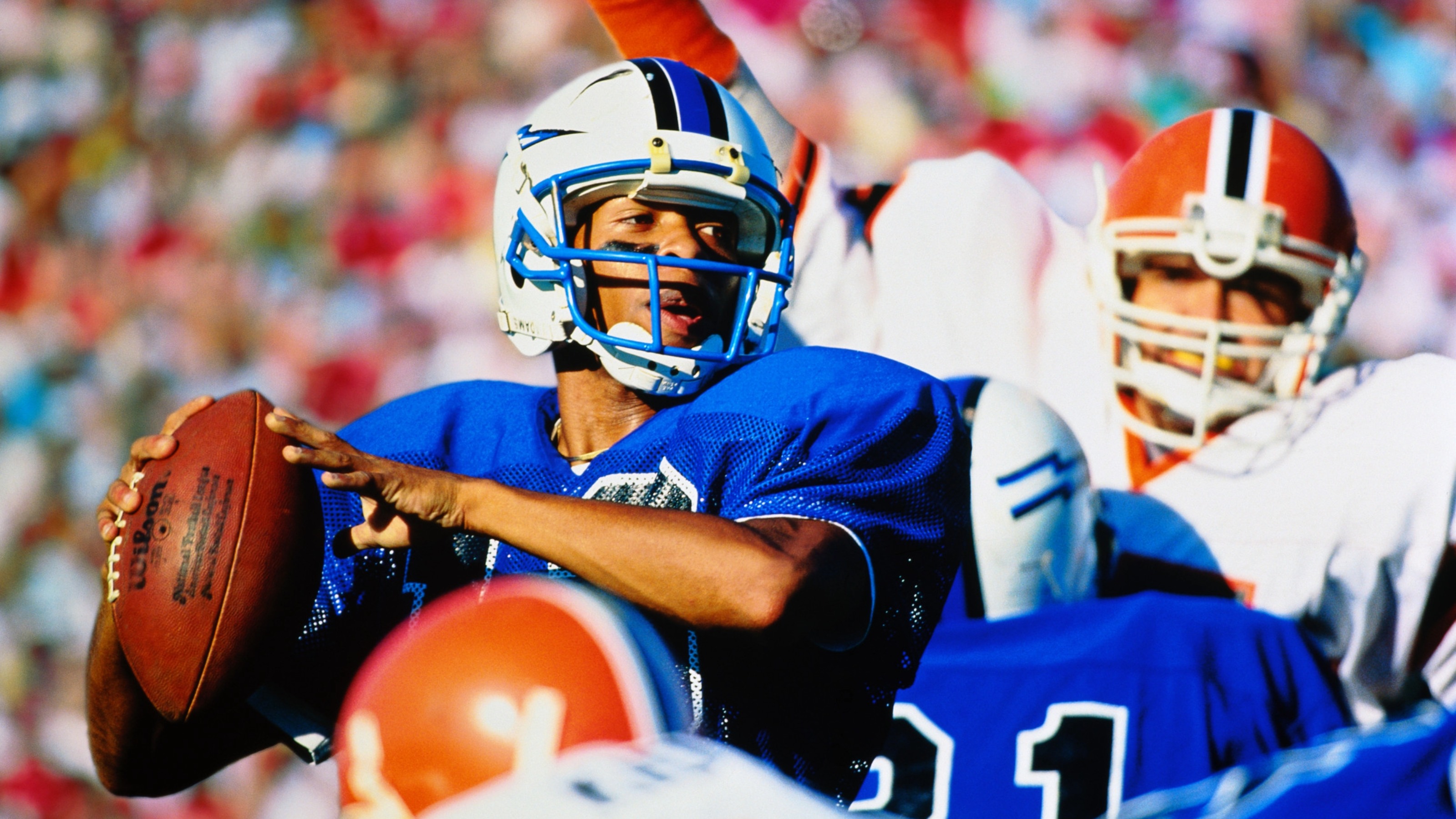 American football, quarterback looking to pass