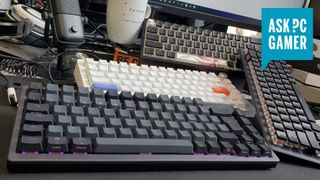 Gaming keyboards scattered across a desk