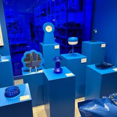 Blue products on blue pedestals