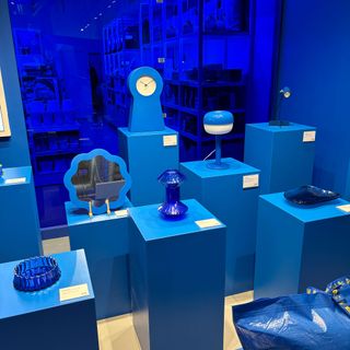 Blue products on blue pedestals