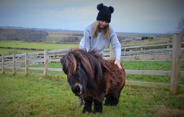 Author Hannah Russell giving Little Alf a good scratch
