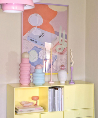 A pastel yellow sideboard with Danish pastel decor