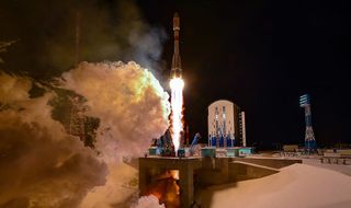 A Soyuz rocket launches 36 OneWeb internet satellites into orbit from the Vostochny Cosmodrome in eastern Siberia on Dec. 18, 2020.