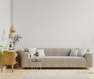 A sofa with a side table