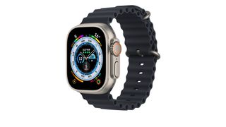 Apple Watch Ultra on white background with displaying showing analogue clock face