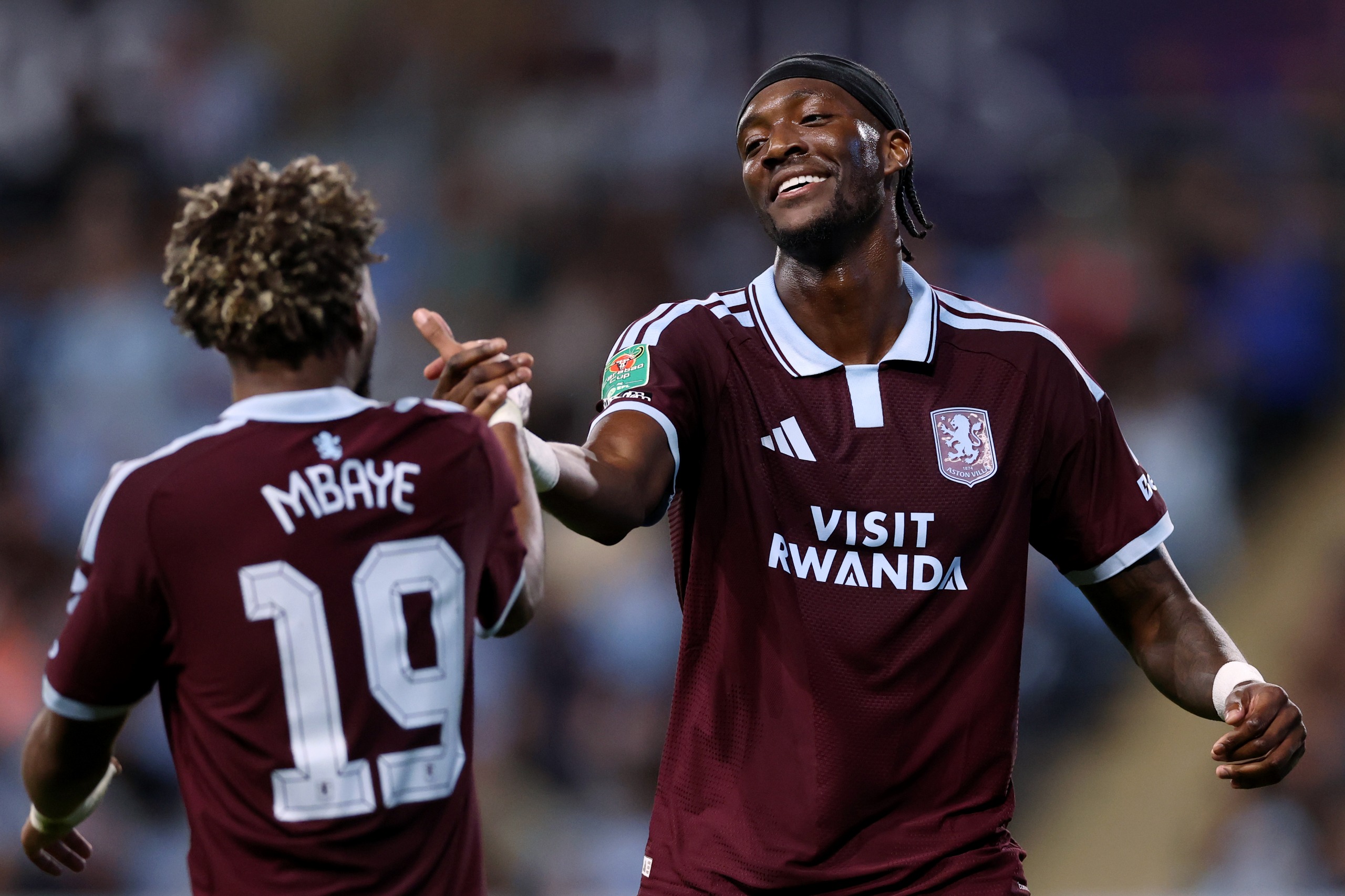 Aston Villa's Ibrahim Mbaye and Tammy Abraham
