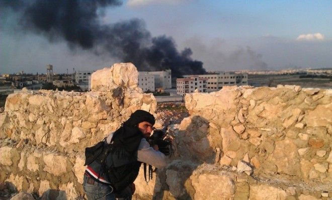 A Free Syrian Army fighter during clashes with forces loyal to President Bashar al-Assad on March 4.