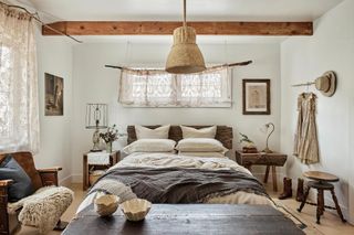 a ranch style bedroom with natural decor