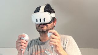 man wearing the meta quest 3 headset
