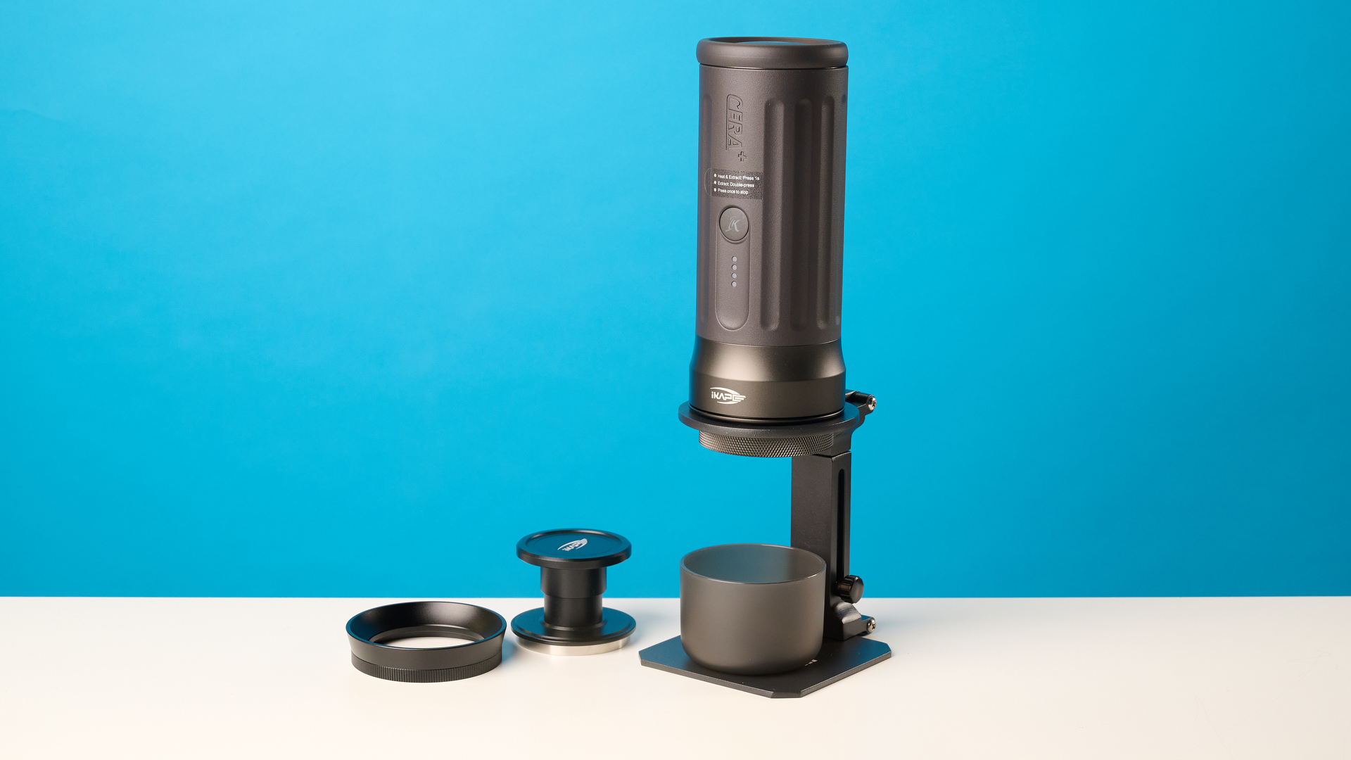 the ikape kapo k2 pro portable coffee maker against a blue background