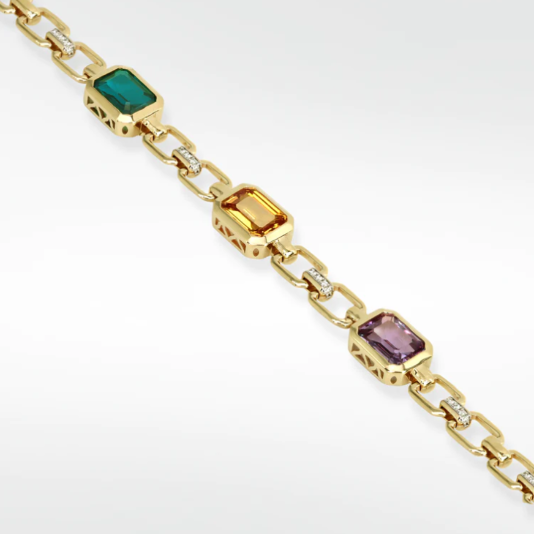 ethical jewellery: gold chain bracelet with colourful gem stones