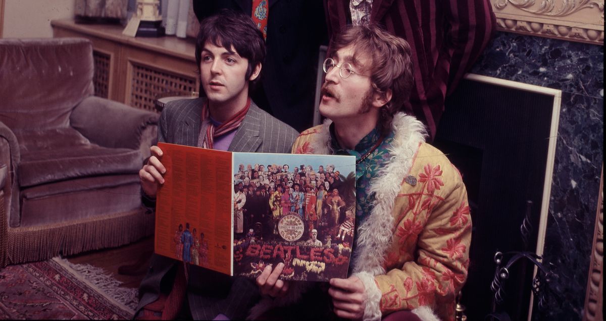 The Beatles pose for the press with their newly completed album, &#039;Sergeant Pepper&#039;s Lonely Hearts Club Band&#039;, at the press launch for the album, held at manager Brian Epstein&#039;s house at 24 Chapel Street, London, 19th May 1967. Clockwise from top left: Ringo Starr, George Harrison (1943 - 2001), John Lennon (1940 - 1980) and Paul McCartney. 