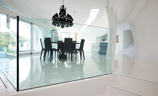 Glass walled dining area in Casa son Vida