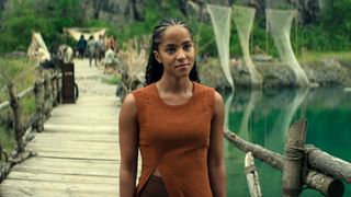 Gaal Dornick standing on a dock and smiling in Foundation season 3 episode 4