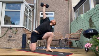 Fit&Well fitness writer Harry Bullmore performing the kettlebell windmill
