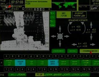 This display shows the International Space Station as it appears in a display aboard the Russian Soyuz TMA-03M space capsule just after undocking on July 1, 2012.