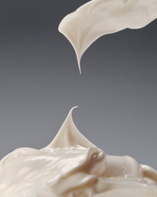 A closeup of Rhode Barrier Butter's smooth texture