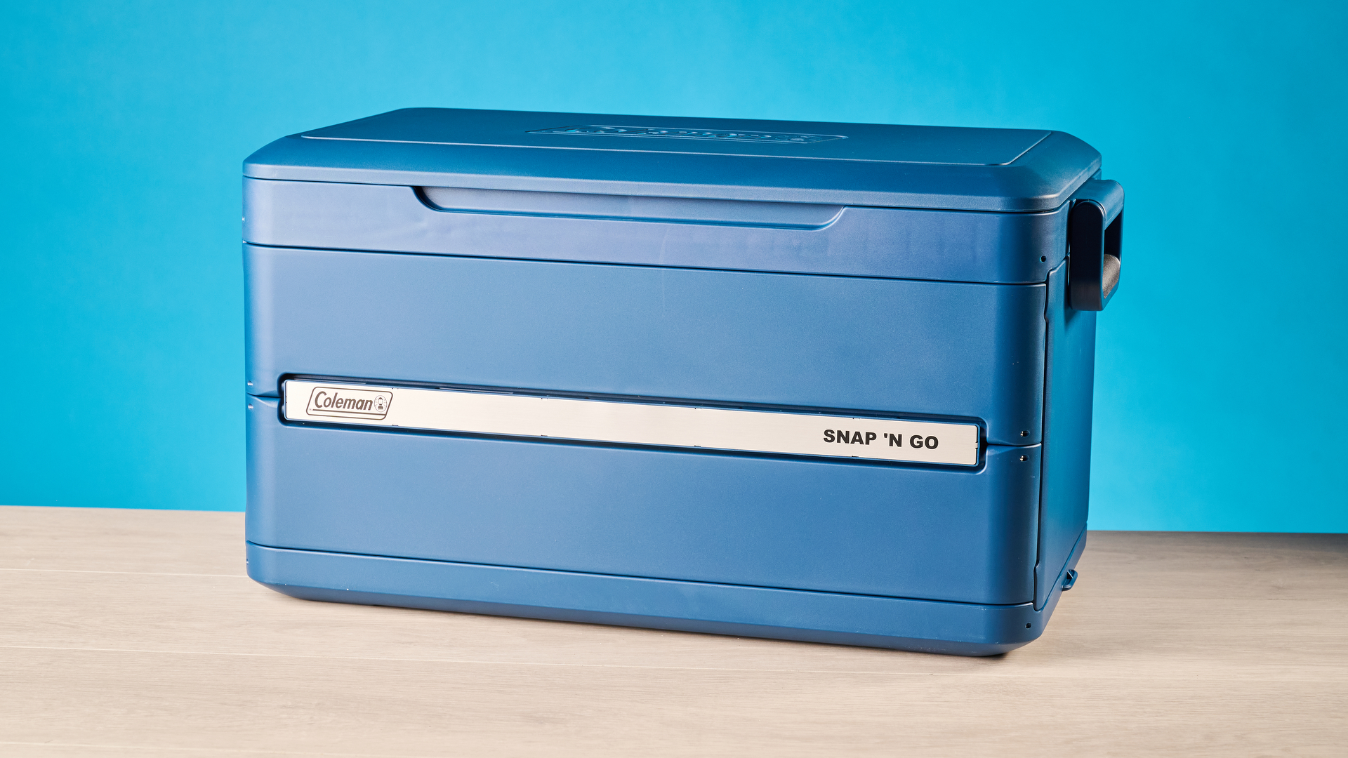 the coleman snap 'n go collapsible cooler photographed with the blue tom's guide background