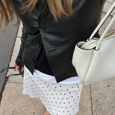 woman wearing knee-length skirt outfit summer 2025