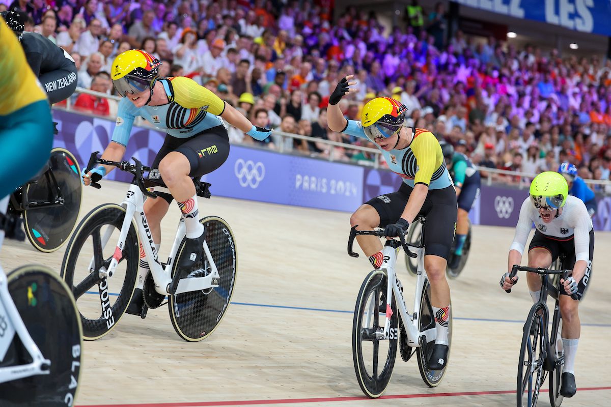 Picture by Alex Whitehead/SWpix.com - 09/08/2024 - Paris 2024 Olympic Games - Track Cycling - National Velodrome, Saint-Quentin-en-Yvelines, France - Women's Madison Final - Katrijn De Clercq (Belgium) and Helene Hesters (Belgium) performing a handsling