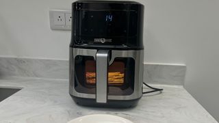 The Paris Rhône Air Fryer cooking in the kitchen