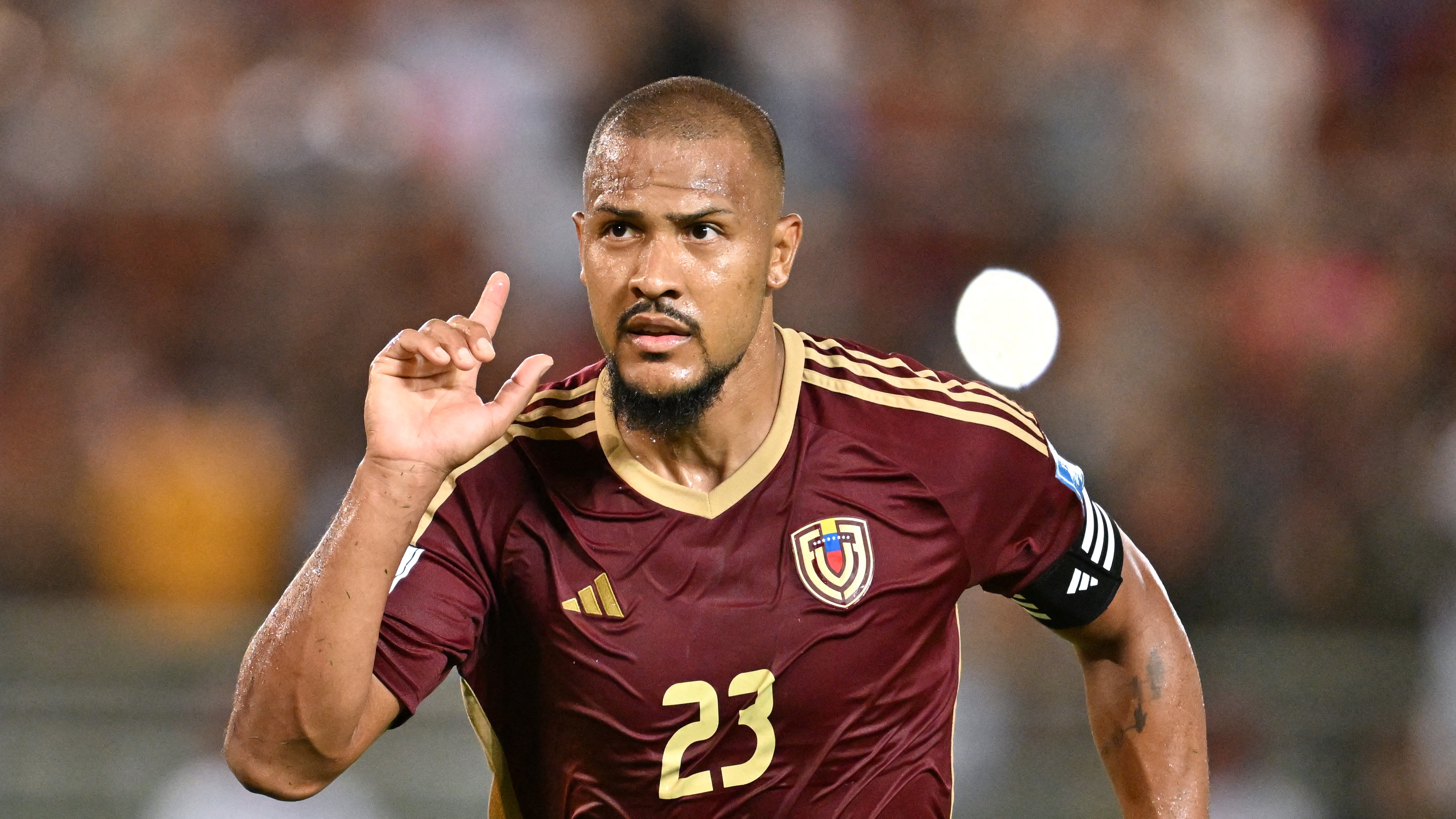 Venezuela&#039;s forward #23 Salomon Rondon celebrates after scoring during the 2026 FIFA World Cup South American qualifiers football match between Venezuela and Peru at the Monumental de Maturin stadium in Maturin, Monagas state. Venezuela, on March 25, 2025. (Photo by JUAN BARRETO / AFP) (Photo by JUAN BARRETO/AFP via Getty Images)