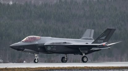 A US-made F-35 fighter aircraft of the Royal Norwegian Air Force lands at Evenes Airbase, near Narvik on March 11, 2026, as NATO conducts its Cold Response military exercise.
