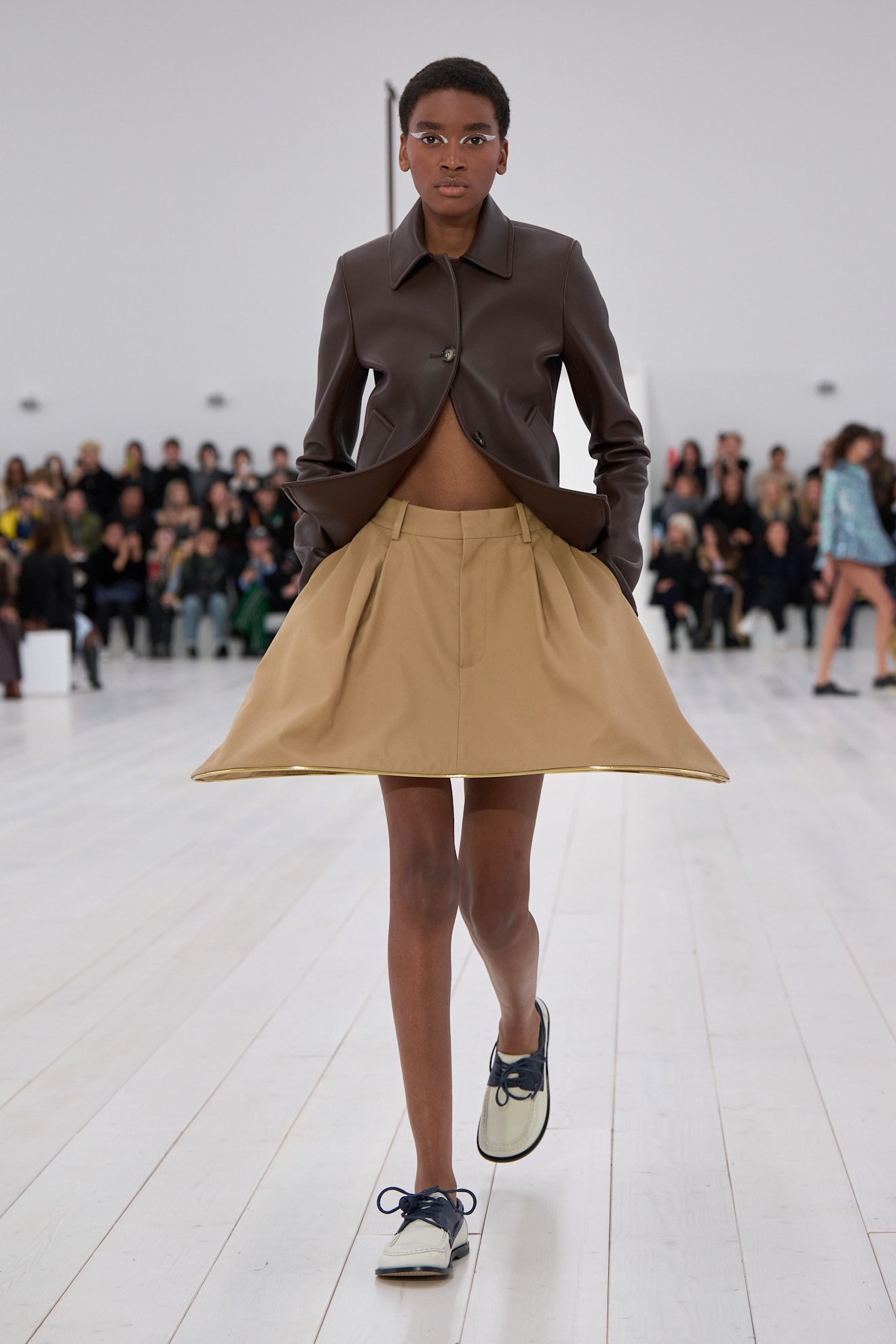 A model wore boat shoes on the Loewe Spring 2025 runway