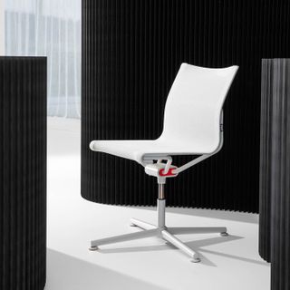 An all-white office chair with a high back.
