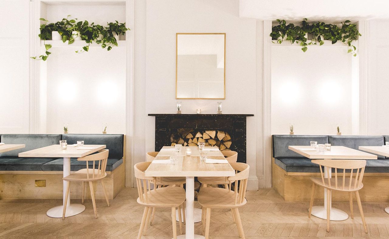 A view of the inside showing a table in the Coal Rooms — London, UK