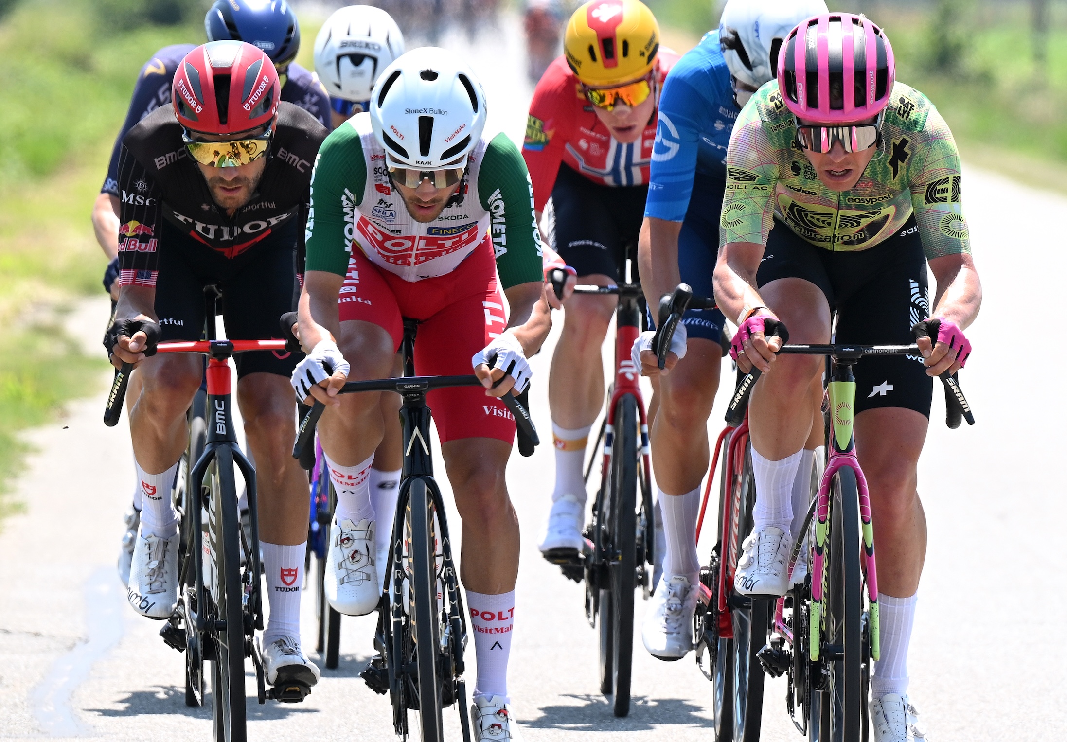 VERBANIA, ITALY - MAY 22: (L-R) Larry Warbasse of United States and Team Tudor Pro Cycling, Diego Pablo Sevilla of Spain and Team Polti VisitMalta and Michael Valgren of Denmark and Team EF Education - EasyPost compete in the breakaway during the 109th Giro d'Italia 2026, Stage 13 a 189km stage from Alessandria to Verbania / #UCIWT / on May 22, 2026 in Verbania, Italy. (Photo by Dario Belingheri/Getty Images)