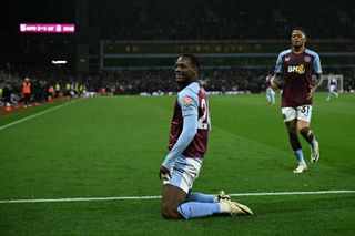 Aston Villa's Columbian striker #24 Jhon Duran (L) celebrates scoring the team's third goal during the English Premier League football match between Aston Villa and Liverpool at Villa Park in Birmingham, central England on May 13, 2024.