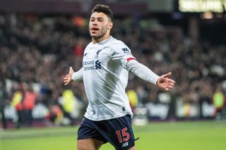 Alex Oxlade-Chamberlain celebrates after scoring for Liverpool against West Ham in January 2020.
