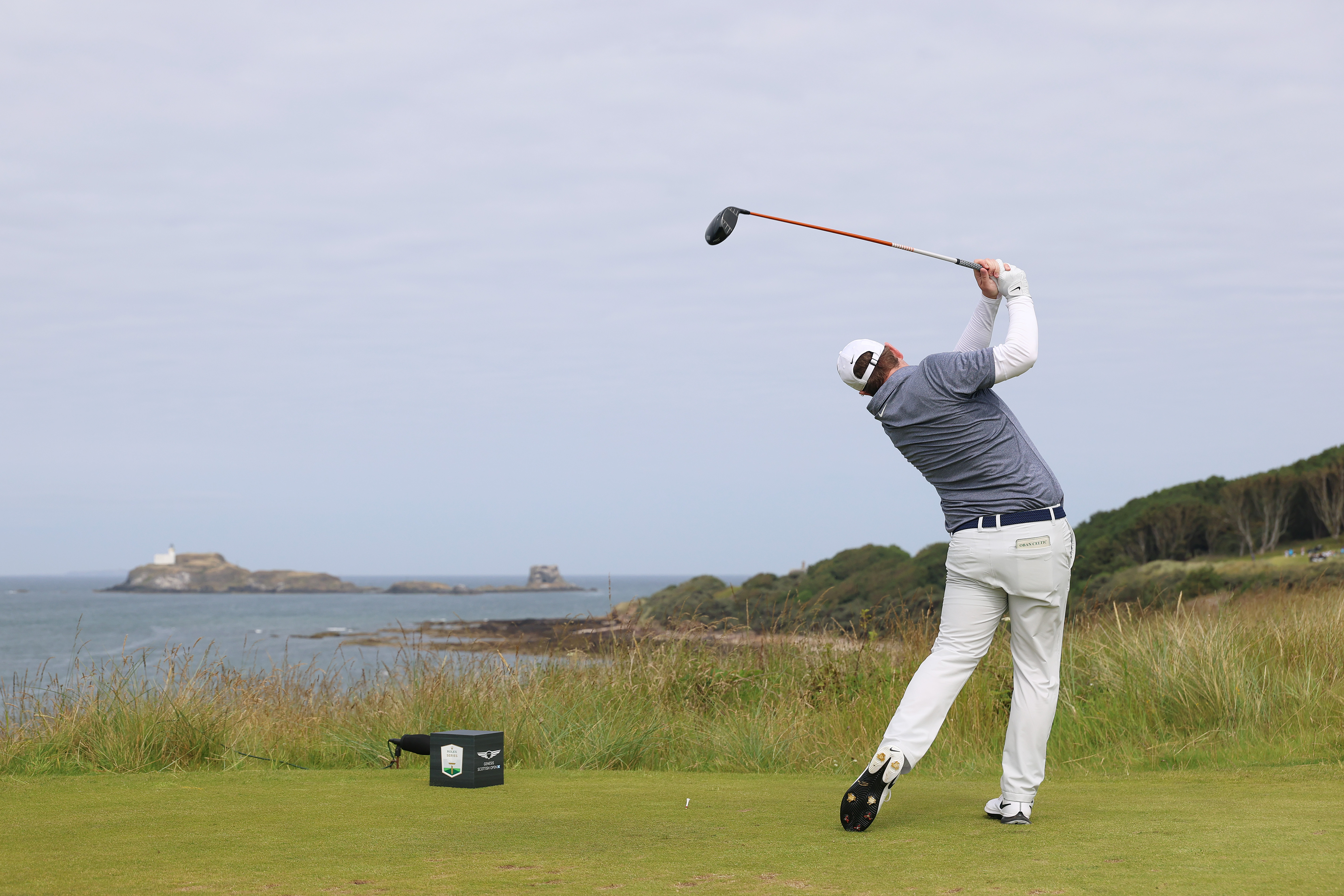 Robert MacIntyre of Scotland tees off on the fourth hole on day four of the Genesis Scottish Open 2026 at The Renaissance Club on July 12, 2026 (Photo by Luke Walker/Getty Images)