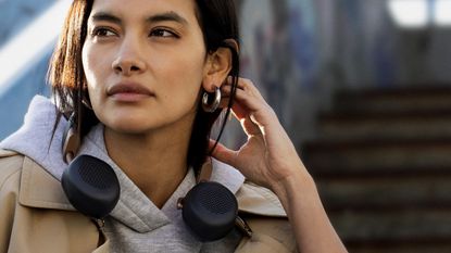 V-Moda S-80 neckband headphones on woman's neck