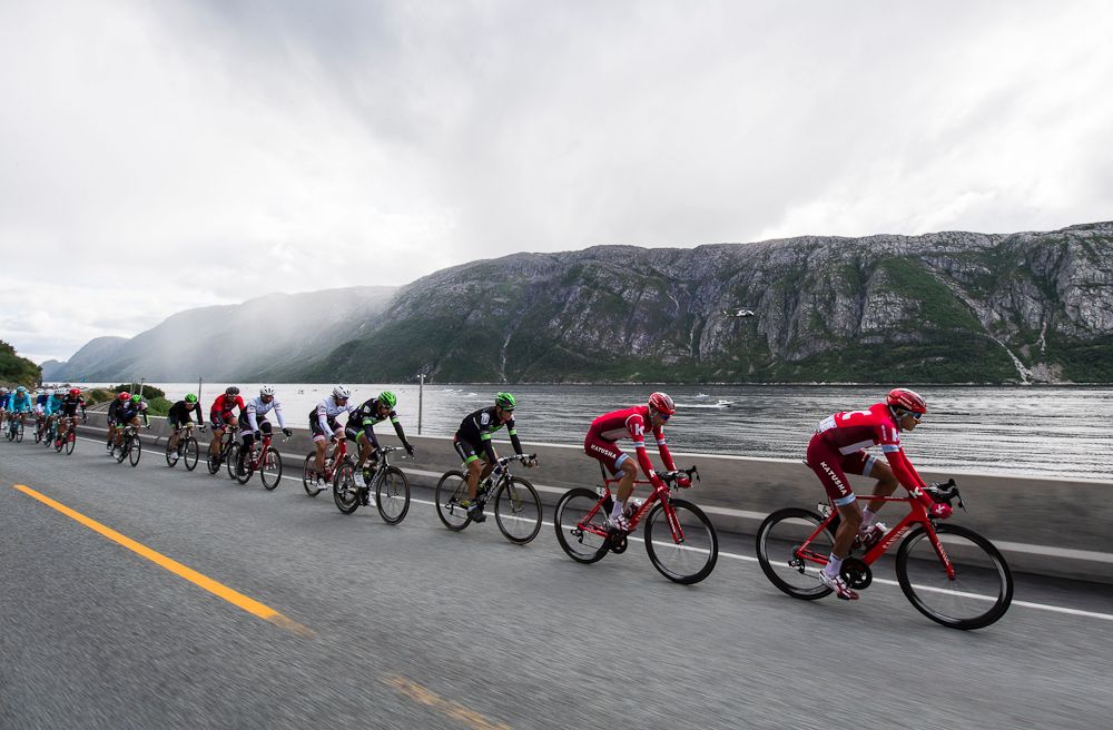 Cyclists ride during the 198,5 km second stage of the Arctic Race of Norway between Mo i Rana and Sandnessjoen