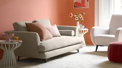 Pink living room with gray sofa