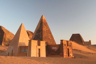 In addition to its palaces Meroe is well known for its fields of steep-sided pyramids where royal members of the kingdom of Kush were buried.