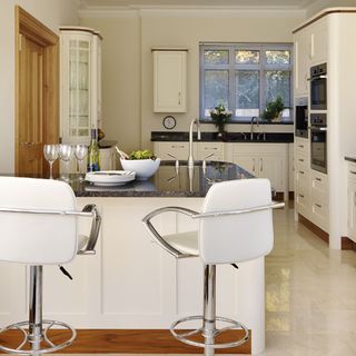 kitchen with breakfast bar and stools